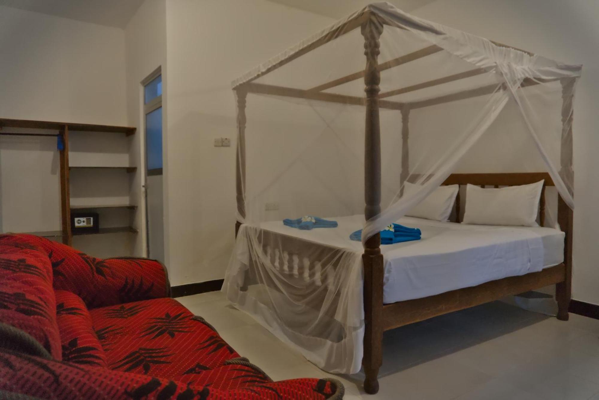 Cocolala Beach House Нунгви Номер фото